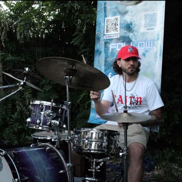 Bruce Marshall playing drums