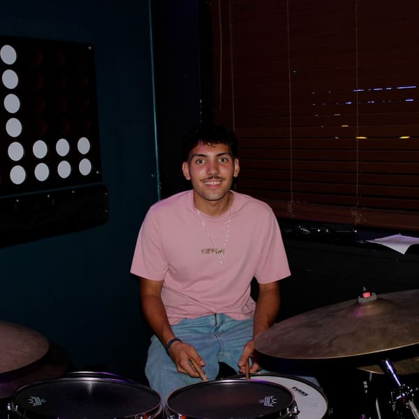 Hunter Oliveira behind the drum kit