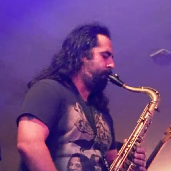 OJ Thibault playing saxophone